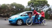 Cyclists meet car travellers